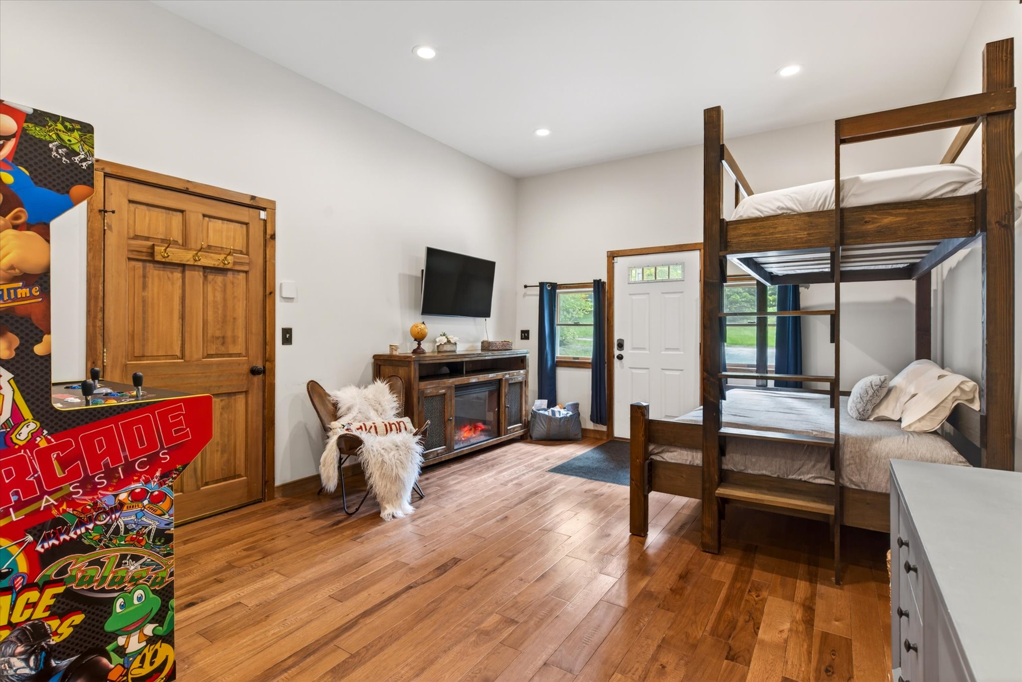 Green Circle Bedroom bunk beds and fireplace angle 2 — Slippery Slope Chalet